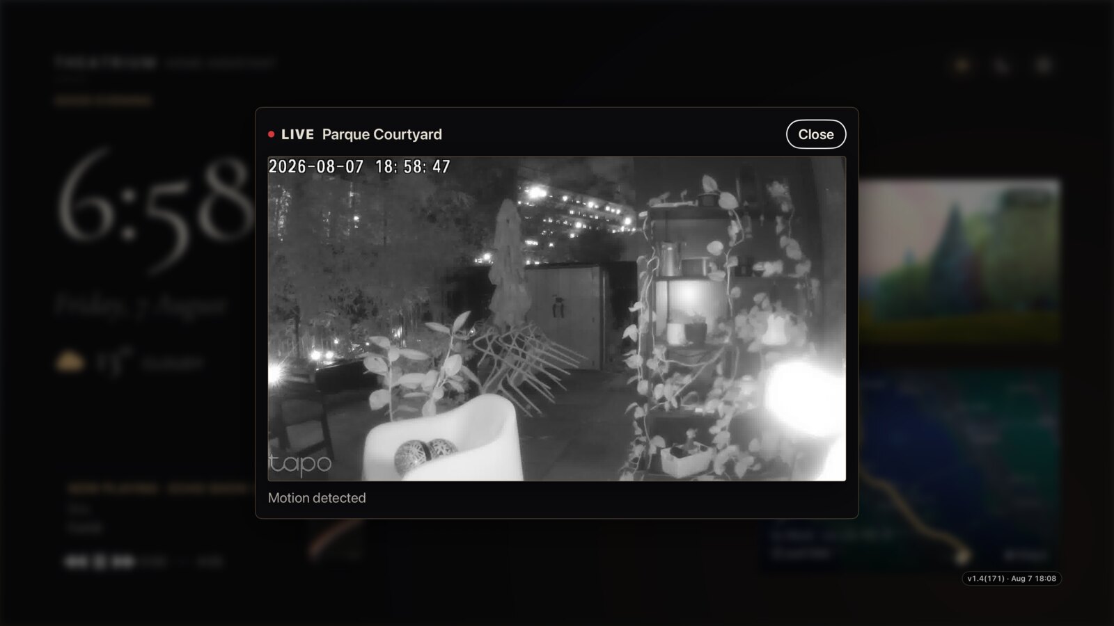 A Home Assistant camera motion-detection alert opened full-screen on the Apple TV, showing the live camera view the moment motion was detected