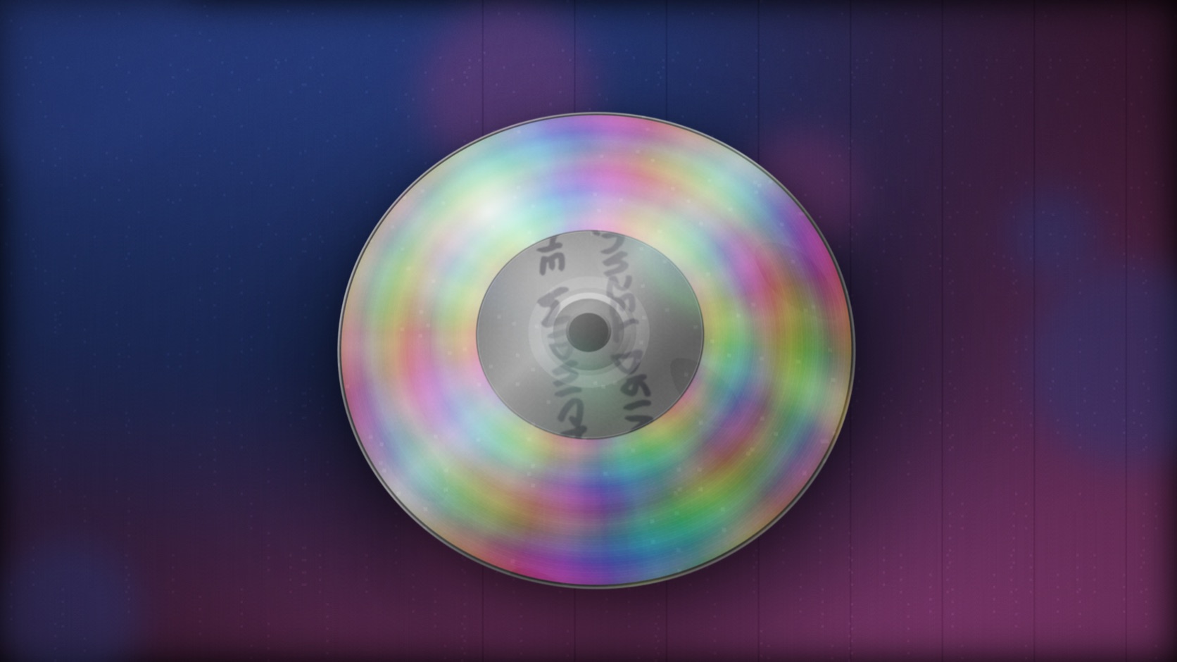 Theatrium Compact Disc visualiser: a 3D iridescent CD spinning, the room lights glowing to match