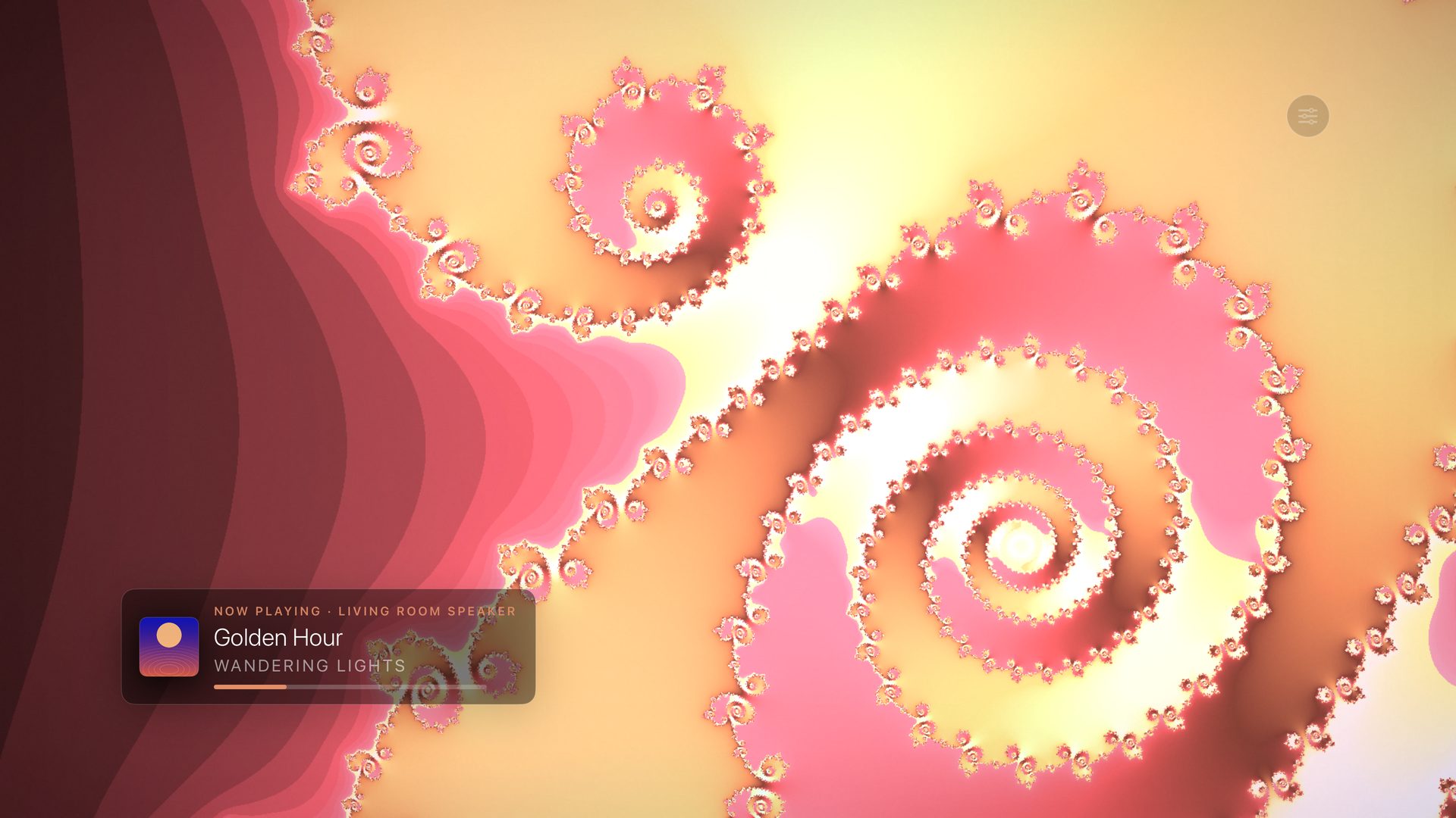 Theatrium Fractal Spiral visualiser in amber and rose, the room lights glowing warm to match