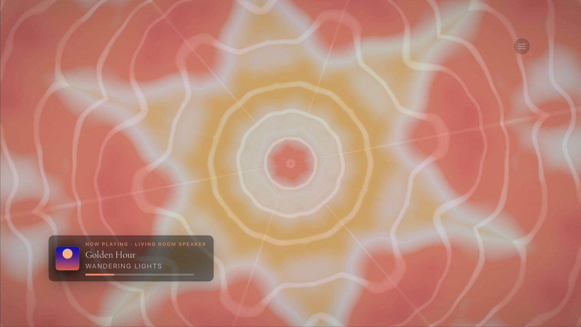 Theatrium Kaleidoscope visualiser: warm symmetrical petals radiating from the centre, the room lights glowing to match
