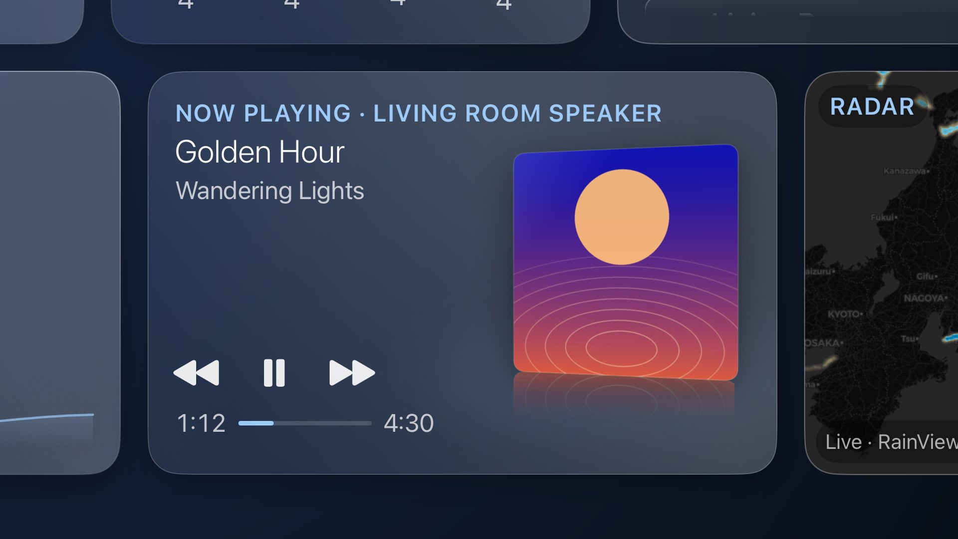 Theatrium’s redesigned now-playing card, the album cover angled on a reflection