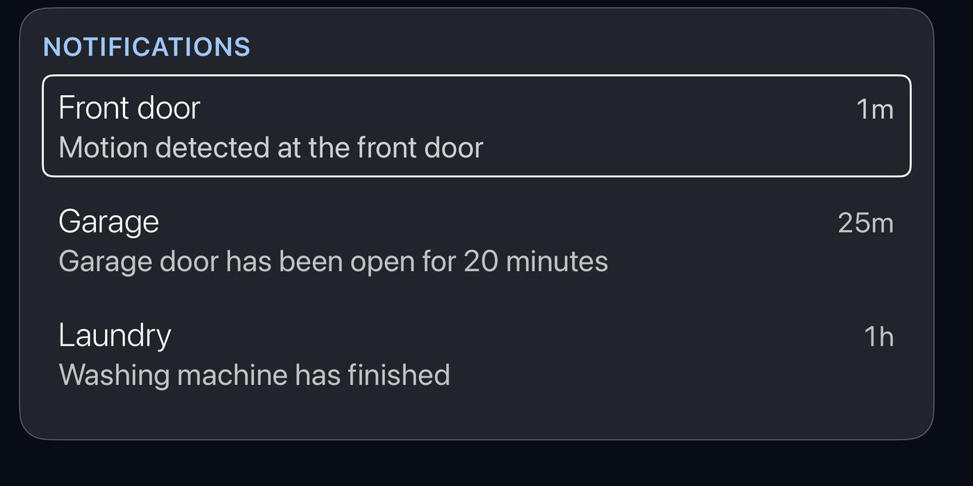 Theatrium's Notifications card listing three alerts: front door motion, a garage door reminder, and a finished washing machine.
