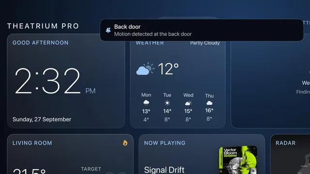 A pop-up alert reading Back door, motion detected, over the dashboard