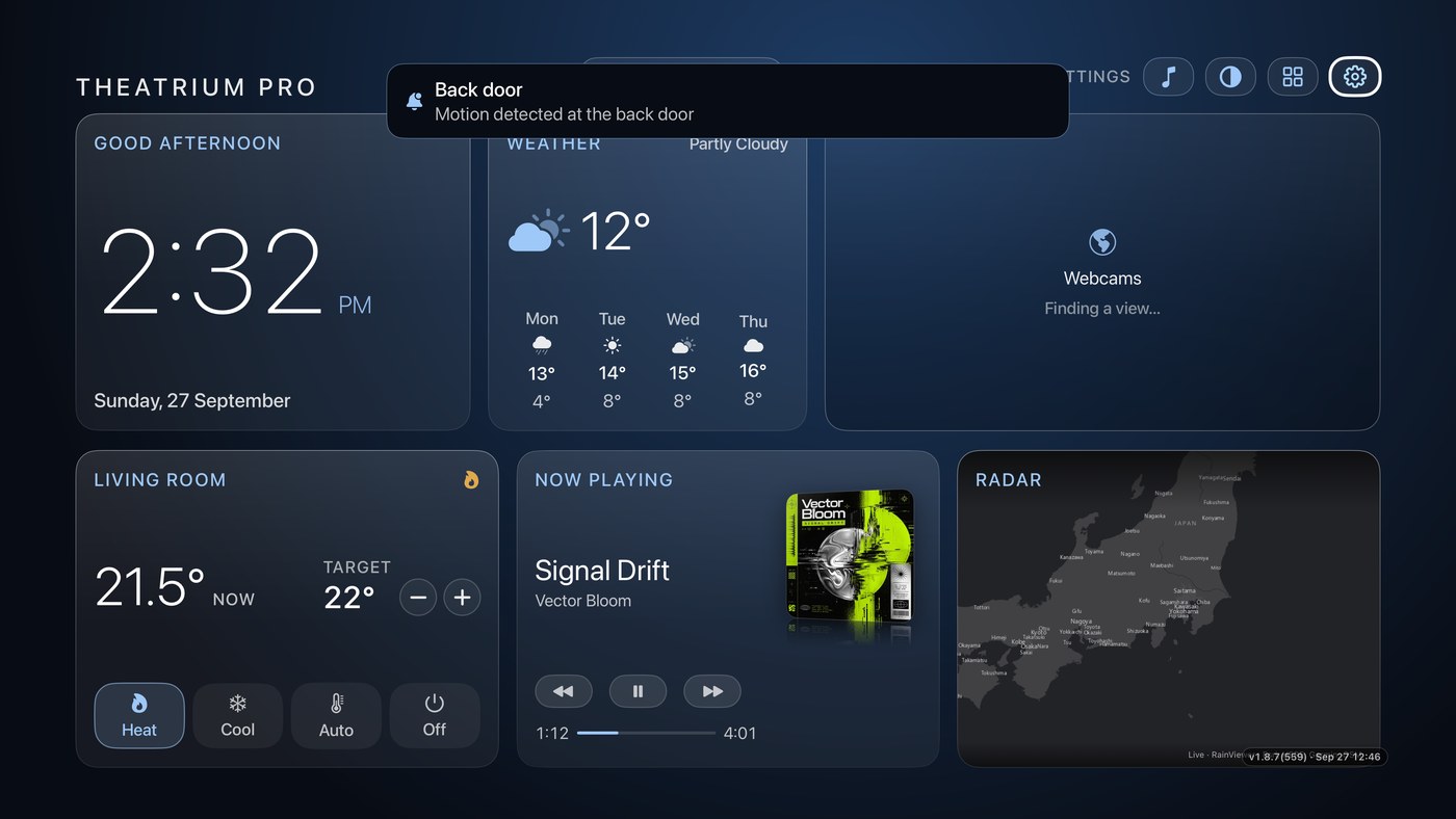 A Theatrium dashboard with a pop-up alert reading Back door, Motion detected at the back door, over the top of the screen.