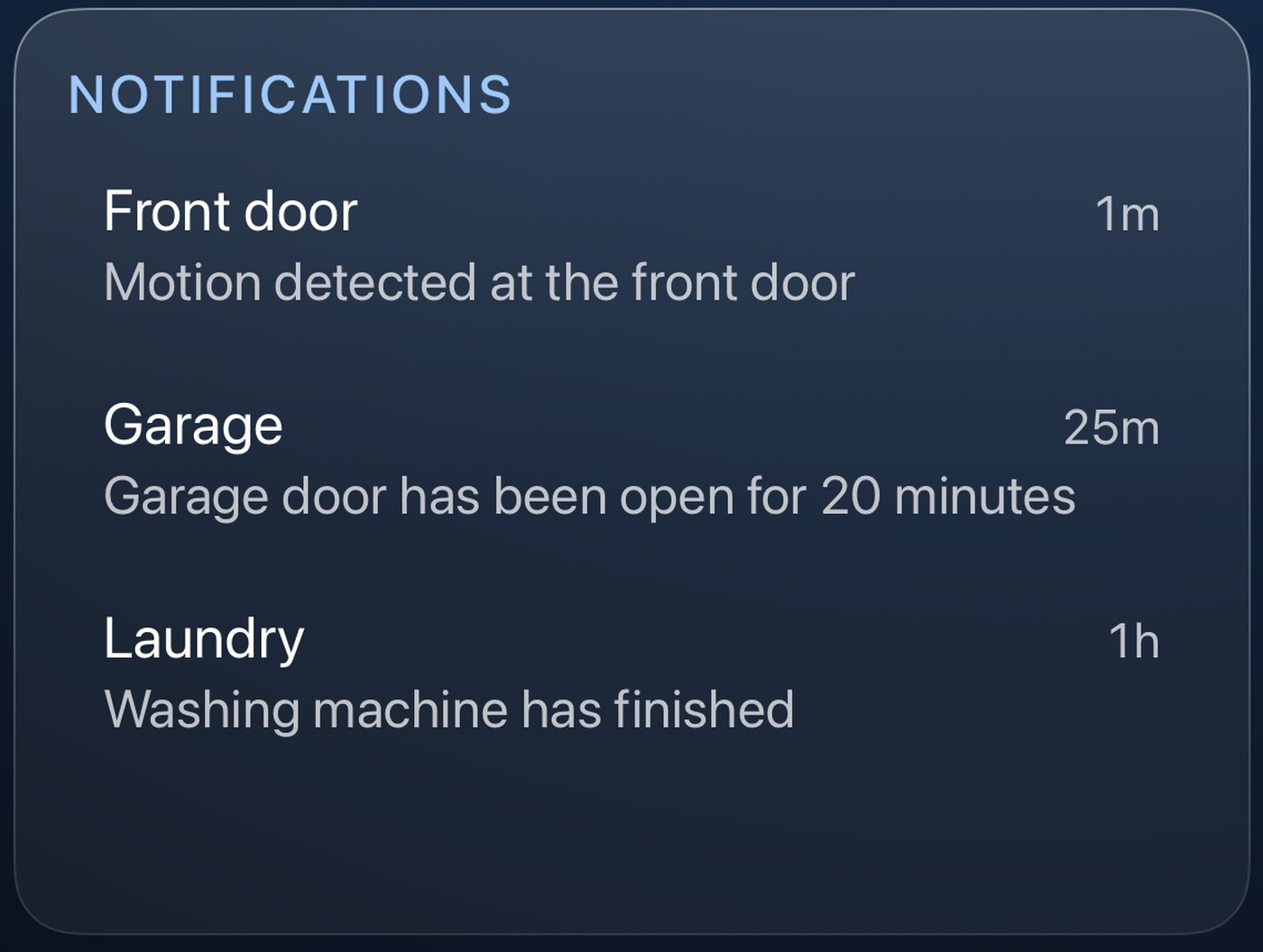 Theatrium's Notifications card listing three alerts: front door motion, a garage door reminder, and a finished washing machine.